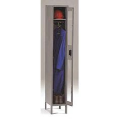 a steel locker with a red hard hat and jacket hanging on it's door