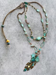 Turquoise and copper Boho necklace with beautiful Koi fish pendant    - Long double-strand necklace     - Meticulously hand-crafted to ensure beauty and quality    - Repurposed and up-cycled gems mixed with modern materials    - Sliding closure allows length adjustment (from 20 to 30 inches)  Arrives in a pretty organza bag, ready for gift giving. Giving Back: A portion of all Hey Judi proceeds is donated to A Good Cup International, an organization dedicated to empowering and cultivating self-w Turquoise Necklace With Lobster Clasp For Jewelry Making, Bohemian Wire Wrapped Turquoise Pendant Necklace, Unique Turquoise Copper Necklaces, Unique Turquoise Copper Necklace, Bohemian Green Copper Jewelry, Adjustable Multi-strand Bohemian Turquoise Necklace, Handmade Turquoise Dangle Necklace, Handmade Bohemian Multi-strand Turquoise Necklace, Adjustable Bohemian Multi-strand Turquoise Necklace