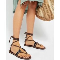 Free People These Gorgeous Wrap Sandals Feature Crisscross Straps, A Lace-Up Ankle With Adjustable Tie Closure, A Closed Heel And Embroidered Details. Wear Them To The Beach, For Trendy Street Style And Even To Dress Up A Casual Outfit. There's No Better Way To Show Off Your Summer Lovin'. La Jolla Wrap Sandals / Brown Combo. ( The First Picture Shows The Sandals In A Different Color Combination. All The Rest Of The Photos Are Of The Actual Sandal) Brown Leather With Contrast Colored Cord Womens Sandals Brown, Fabric Embroidery, Wrap Sandals, Trendy Street Style, Brown Leather Sandals, Free People Shoes, Embroidered Details, Summer Lovin, Brown Sandals