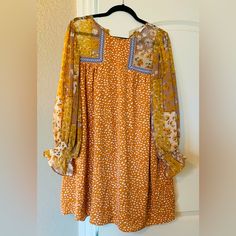 Boho Style, Long Sleeve Shift Dress. Purchased From An Online Boutique But Never Worn. Size Medium But Does Run Large. Yellow Shift Casual Dress, Yellow Shift Dress Casual, Casual Yellow Shift Dress, Mustard Floral Print Mini Dress, Mustard Floral Mini Dress, Yellow Printed Fall Dress, Yellow Long Sleeve Mini Dress With Floral Print, Yellow Floral Print Dress For Fall, Yellow Floral Print Fall Dresses