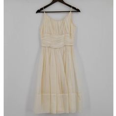 "Vintage 1960's Girly Party Dress no tag w/ brand, size or material in good condition- some un gathering due to age & damage from dry cleaner, not noticeable when worn fits like a Extra Extra Small measurements (laid flat & doubled): bust 28\" waist 25\" hips free length 41\" Please keep in mind when buying Vintage clothing you are purchasing something that is at least 20 years old & pre-washed. Most Vintage items show signs of wear. We do our best to photograph/explain the condition of the item If you have any questions about a particular item please contact" Cream Vintage Dress For Spring Party, Spring Party Vintage Pleated Dress, Pleated Vintage Dress For Party, Vintage Pleated Dress For Party, Spring A-line Vintage Dress For Vintage Events, Summer Party Cotton Vintage Dress, Summer Party Vintage Cotton Dress, Spring A-line Vintage Dress For Cocktail, Spring A-line Vintage Cocktail Dress