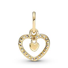 Always shine bright with the Sparkling Double Heart Dangle Charm. Hand-finished in 14k gold, this design features a heart-shaped frame set with sparkling cubic zirconia, with a small polished heart detail dangling in the center. Style this piece with other 14k gold charms for a glowing look or team with sterling silver designs to allow the heart-shaped motif to stand out. Alternatively, gift this style to someone close to you as a token of your love. Gold Heart Pendant Jewelry With Sparkling Stones, Elegant Dangle Charms For Valentine's Day, Elegant Heart Charm For Anniversary, Elegant Yellow Gold Heart Charm, Elegant Valentine's Day Dangle Charms, Elegant Yellow Gold Charms For Valentine's Day, Elegant Heart Charm For Valentine's Day, Elegant Gold Charms For Valentine's Day, Elegant Heart Shaped Dangling Charms