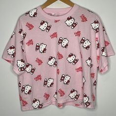 New Without Tags, Still Has The Plastic Thing From The Tag Hello Kitty By Sanrio Size Xl Short Sleeve Crewneck T-Shirt Light Pink With Hello Kitty Print And In Cursive All Over 50% Cotton 50% Polyester Red Cartoon Print Top For Spring, Cute Printed Pink Top, Cute Pink Printed Tops, Cute Hello Kitty Print Tops For Spring, Hello Kitty Y2k Summer Top, Pink Y2k Printed Tops, Y2k Pink Printed Tops, Pink Y2k Style Printed Tops, Pink Printed Y2k Tops