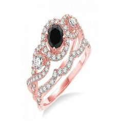 a rose gold ring with black and white diamonds