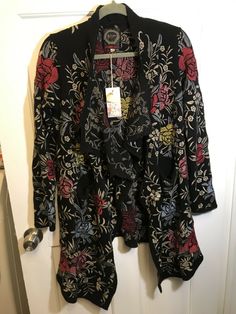 Johnny Was Biya Pua Black Cotton Floral Embroidered Wrap Cardigan S Boho Chic. Condition is New with tags. Shipped with USPS Priority Mail. About 18.5” pit to pit 31” long From smoke free home $450 I would encourage you to Google this and look at stock photos for more info 2024 Aesthetic, Wrap Cardigan, Johnny Was, Priority Mail, Black Cotton, Vest Jacket, Boho Chic, Kimono Top, Women Accessories