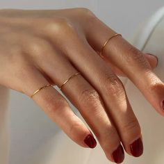 This ultra thin stacking ring by is made of 18K gold and rose gold plating for a timeless minimalist look. The minimalist design adds a delicate touch to any outfit, while the midi gold ring is suitable for both indoor and outdoor occasions. [MATERIAL]: Yellow brass with real 18k gold plated. Our ring will not tarnish or turn green. Clean Sterling Silver, Chic Rings, Minimal Ring, Layered Rings, Gold Rings Stackable, Ringe Gold, Gold Ring Stack, Gold Filled Ring, Gold Band Ring