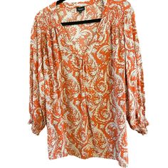 Jones & Co Women's Burnt Orange Floral Bohemian Blouse Plus Size 3X Smocked Fall Item is in good, pre-owned condition.  No issues noted with the blouse.  The item has been laundered according to garment specifications. Content: Rayon Measurements are approximately as follows: Armpit to armpit: 30" Back of collar to bottom hem: 28" We ship most items out the next business day.  Please contact us with any questions.  We are happy to combine shipping when possible. Thank you! 2359 Features: * Boehmian Size: Womens 3X Condition: Pre-Owned Good Fall Vacation Blouse With Smocked Bodice, Bohemian Blouse With Smocked Bodice For Vacation, Bohemian Blouse With Smocked Cuffs For Daywear, Bohemian Long Sleeve Peasant Top With Smocked Bodice, Bohemian Peasant Top With Smocked Bodice And Long Sleeves, Bohemian Smock Blouse For Daywear, Bohemian Fall Blouse With Smocked Bodice, Bohemian Smocked Bodice Blouse For Fall, Bohemian Blouse With Smocked Bodice For Fall