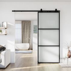 a white living room with sliding glass doors