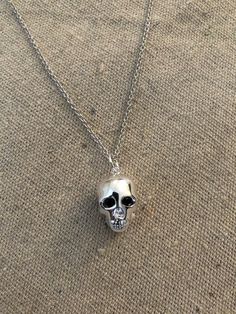 Sterling silver Memento Mori Skull with black CZ stones for eye on a 16" chain- sterling silver with rhodium plating. SHOW EXCLUSIVE Memento Mori Skull, 3d Skull, Skull Necklace, For Eyes, Memento Mori, Cz Stone, Rhodium Plated, Silver Necklace, 925 Sterling Silver