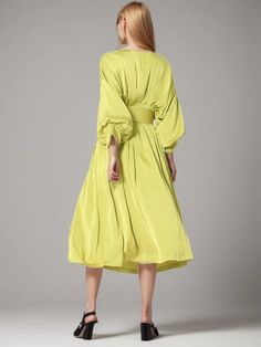 Specification A-line Dress With Pleated Sleeves For Brunch, Green Midi Dress With Pleated Sleeves, Spring Green Dress With Pleated Sleeves, Green Spring Dress With Pleated Sleeves, Casual Brunch Dresses With Pleated Sleeves, Spring Knee-length Belted Long Sleeve Dress, Belted Long Sleeve Knee-length Dress For Spring, Solid Color Spring Evening Dresses, Green Pleated Midi Dress For Daywear