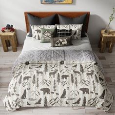 a bed with black and white designs on it