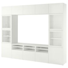 an empty white entertainment center with shelves