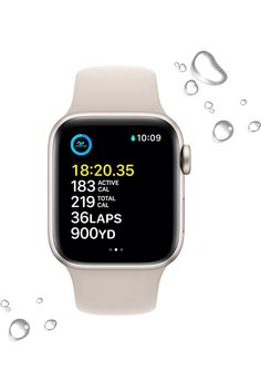 an apple watch with water droplets around it and the time displayed on the screen,