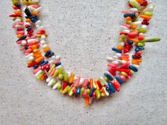 This 22 inch southwestern necklace is made from branch coral beads in colors of white, orange, red, lime green, and red, and navy blue. The ends are small shell heishi with a small silver toggle clasp. The matching earrings are included in the set. This is a lovely summer necklace set! Southwestern Necklace, Hand Knotted Necklace, Black Onyx Necklace, Onyx Necklace, Coral Necklace, Coral Jewelry, Summer Necklace, Shell Jewelry, Agate Necklace