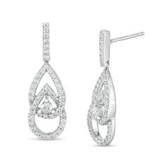 Surprise her with a thoughtful look that reflects your bond - these You Me Us 1 ct. t.w. diamond interlocking teardrops earrings. Fashioned in cool 10K white gold Each linear drop showcases diamonds lining a pair of interlocked open teardrop shapes - representing the shared bond between you and the one you love. Sparkling at the center, a 1/10 ct. diamond signifies your union. The linear bar post also shimmers with diamonds. These 1 ct. t.w. diamond earrings secure comfortably with friction back Formal Brilliant Cut Diamond Teardrop Earrings, Formal Brilliant Cut Teardrop Diamond Earrings, Drop Diamond Earrings With Pave Setting, Timeless Teardrop Earrings With Diamond Accents, Timeless Teardrop Cubic Zirconia Diamond Earrings, Timeless Teardrop Brilliant Cut Diamond Earrings, Teardrop Diamond Earrings With Diamond Accents For Formal Occasions, Timeless Brilliant Cut Teardrop Diamond Earrings, Diamond White Teardrop Diamond Earrings