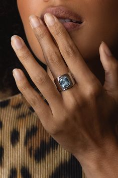 Our best-selling Lilly ring, now remade in platinum, exudes timeless elegance. This exquisite piece, cherished by many, combines enduring quality with a classic design for a truly stunning look. Made locally in NYC. L: 24.58mm, W: 19.67mm Cushion Aquamarine 4.05cts 10mm mined in Mozambique Platinum Luxury Solitaire Emerald Ring For Formal Occasions, Silver Timeless Promise Ring, Timeless Silver Promise Ring, Timeless Princess Cut Jewelry With Tension Setting, Luxury Rose Gold Ring With Tension Setting, Timeless Silver Jewelry For Promise, Luxury White Gold Topaz Ring In Sterling Silver, Timeless Blue Topaz Ring, Timeless Sapphire Solitaire Promise Ring