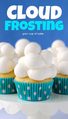 cupcakes with white frosting sitting on a cake stand