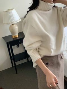 Plush, relaxed turtleneck in soft wool blend. - Relaxed fit- Dropped shoulders- Ribbed neck, hem, cuffs- Length 25", Bust 53", Sleeve 32"- Extra fine wool 50%, Nylon 35%, Fox 10%, Raccoon 5%- Dry clean- Imported Winter Workwear Turtleneck With Ribbed Cuffs, White Turtleneck For Workwear In Fall, White Turtleneck For Fall Workwear, Beige Turtleneck For Workwear In Fall, White Turtleneck For Workwear In Winter, Casual Wool Turtleneck With Ribbed Cuffs, Fall Beige Turtleneck For Workwear, Cozy Wool Turtleneck With Ribbed Cuffs, Fall Workwear Turtleneck With Ribbed Cuffs