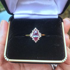 An extraordinary Contemporary Art Deco Marquise Shaped Alexandrite Engagement ring set in 14K gold enveloped in dynamic shapes of diamonds, classy and unique for that special somebody. Pictures don't do this ring justice! Only one ring in 14k Yellow gold is in stock. Check out Instagram page for more photos of this ring in different metal and stone: https://www.instagram.com/p/Bt60PmMFuEJ/ ♦ Main Ring Information ♦ Center Stone: Chatham alexandrite, Marquise Faceted Cut, 10x5mm, Green to purple( Formal Marquise Cut Gemstone Cluster Ring, Elegant Marquise Ruby Ring Gift, Luxury Marquise Cut Cluster Ring For Gift, Elegant Marquise Ruby Ring As Gift, Marquise Ruby Ring With Diamonds, Luxury Cluster Ring With Marquise Cut For Gift, Pink Diamond Formal Birthstone Ring, Elegant Proposal Birthstone Ring With Rose Cut Diamonds, Pink Diamond Birthstone Ring For Formal Events