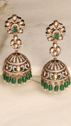 Discover the timeless elegance of these meticulously crafted jhumka earrings, designed to add a touch of regal charisma to your look. Cz Necklace, Jhumka Earrings, Fashion Attire, Custom Earrings, Cz Stone, Victorian Era, Indian Jewelry, Antique Gold, Jewelry Pieces