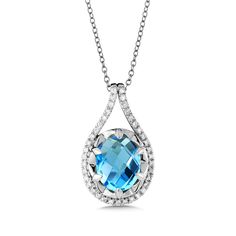 Birmingham Jewelry Item Number: BJP118W-DBT Type: Pendant Style: Fashion Jewelry 14K White Gold Pendant Blue topaz and diamond pendant in 14k white gold with oval 10.00mm X 8.00 mm center. Total Diamond Weight: 0.15ct approx. *The possibilities are not limited to the options in the dropdown. For pricing on further customizations & special options, please call: 1-586-939-5100 Dazzling Blue Necklace With Brilliant Cut, Luxury Blue Diamond Necklace For Anniversary, Blue Luxury Diamond Necklace For Anniversary, Blue Diamond Necklace For Wedding, Formal Blue Diamond Gemstone Necklace, Formal Blue Gemstone Diamond Necklace, Blue Diamond Briolette Necklace, Blue Diamond Gemstone Necklace For Anniversary, Blue Diamond Pendant Necklace For Anniversary