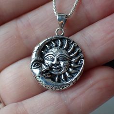 This is a very beautiful sterling silver celestial charm with a detailed sun and moon. It measures 1.1” long including the bail and .8" wide. This charm is photographed on a 1 mm sterling silver rounded box chain which is sold separately. It can be found here. Celestial Sun And Moon Sterling Silver Necklace, Sterling Silver Sun And Moon Spiritual Necklace, Sterling Silver Spiritual Necklace With Sun And Moon Design, Spiritual Sterling Silver Necklace With Sun And Moon Design, Spiritual Sterling Silver Sun And Moon Necklace, Silver Celestial Necklace Stamped 925, Silver Celestial Necklace 925, Sterling Silver Sun And Moon Round Necklace, Sterling Silver Necklaces With Sun And Moon Design