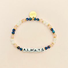 Our handcrafted bracelets are each made with a little word that reminds you of - your strengths, your travels, your loved ones, and so much more. By wearing WILDCHARM bracelets, you get a daily reminder of something that is important to you. This listing is for the bead color scheme you see in the images, customize any word you like! D E T A I L S  --------------------------- * Hand-crafted using fine-cut crystals and acrylic black, gold, or silver letter beads * Gold-plated brass hardware or si Letter Bead Bracelet, Letter Bead Bracelets, Word Bracelet, Acrylic Letters, Handcrafted Bracelets, Letter Beads, Friendship Gifts, Initial Letters, Photo Bracelet