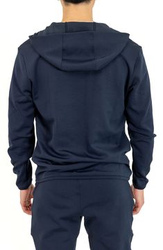 A breathable, wrinkle-resistant cotton blend offers four-way stretch comfort in a modern jacket. 26" length Fixed hood 50% cotton, 43% polyester, 7% spandex Hand wash, line dry Imported Cotton Athleisure Activewear With Double-lined Hood, Cotton Sportswear Outerwear With Pockets, Sporty Cotton Outerwear With Side Pockets, Solid Cotton Hooded Jacket For Loungewear, Cotton Athleisure Outerwear For Loungewear, Functional Cotton Track Jacket For Fall, Stretch Fleece Outerwear With Drawstring Hood, Functional Cotton Hoodie With Pockets, Sporty Cotton Track Jacket For Loungewear