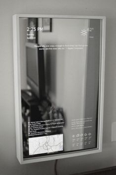 a black and white photo of a bathroom mirror