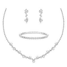 a necklace, bracelet and earring set in white gold with round brilliant cut diamonds