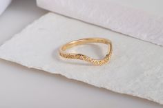 "Here's V Design Dotted Diamond Curved Stacking Ring for Bride. Our 14K Gold Stacked Wishbone Band will be perfect Shower Jewelry as in her daily life! This V Shape Simulant Ring will be either exciting Shower Gifted for bestfriend, girlfriend or women. Simulant Diamond Ring will look so pretty on her index or middle finger. From the detailing to the paved and band motif, chic fake diamond ring has alternating curved and chevron design. This Stunning and curve enhancer ring will be best paved ch Fine Jewelry Engraved Ring For Wedding, Yellow Gold Engraved Stackable Wedding Rings, Engraved Yellow Gold Stackable Rings For Wedding, Engraved Yellow Gold Stackable Wedding Rings, Engraved Diamond Wedding Ring In 14k Gold, Engraved Wedding Diamond Ring In 14k Gold, Heirloom 14k Gold Wedding Bands, Heirloom Gold Stackable Wedding Rings, Yellow Gold Wedding Diamond Ring With Decorative Band