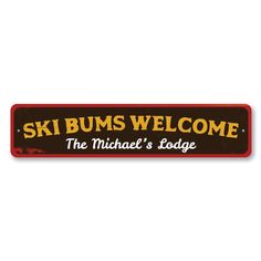 a sign that says ski bums welcome the michael's lodge