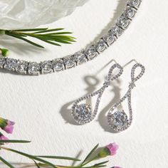 Bridal accessories, silver jewelry, teardrop earrings, cubic zirconia earrings, vintage earrings, silver dangle earrings ► Spend $200 | Receive 10% OFF Your Order with Code: 10OFF200 ► Please note in your order when your wedding date is Dainty long drops paved with Cubic Zirconia crystals. Complete the look with swirling pin curls in a mesmerizing pony. MATERIALS & MEASUREMENTS - 18K White Gold plated - Cubic Zirconia Pave Crystals - Hypoallergenic, lead & nickel free - Post Back Earring Crystal Drop Earrings Wedding, Drop Earrings Wedding, Silver Bridal Earrings, Bridal Statement Earrings, Dangle Earrings Silver, Bridal Earrings Drop, Pin Curls, Back Necklace, Round Pendant Necklace