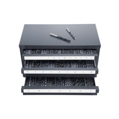 three black drawers are stacked on top of each other, with two pens in the middle