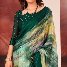 Green colored saree is made from chiffon fabric which is highlighted with beautiful printed work as shown. Comes along with unstitched chiffon blouse piece which you can customise as per your design/style. Occasion - You can wear this saree for casual, and homely events. Note:- the actual product may differ slightly in color and design from the one illustrated in the images when compared with computer or mobile screen. Measurements: Saree : Chiffon : 5.5 Mtrs Blouse : Chiffon : 0.8 Mtr Material: Chiffon Stitch Type: Unstitched Country of Origin: India Care Guide: Dry Clean Printed Chiffon Saree, Saree Chiffon, Blouse Chiffon, Mobile Screen, Green Ombre, Chiffon Saree, Chiffon Blouse, Print Chiffon, Chiffon Fabric