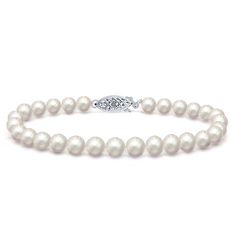 This dainty white Freshwater pearl bracelet adds instant elegance to any outfit. The small 5.0-5.5mm sizes are highly versatile, and the AAA quality pearls have been selected for their bright luster and delicate pastel overtones. Pearls are knotted on white silk and finished with a 14k gold clasp. Timeless White Pearl Bracelets, Timeless White Akoya Pearl Bracelets, Timeless White Pearl Jubilee Bracelet, Timeless White Akoya Pearl Bracelet, Elegant White Single Strand Bracelets, Elegant White Single Strand Bracelet, White Akoya Pearl Bracelets For Formal Occasions, Timeless White Pearl Bracelet With Round Beads, Elegant Single Strand Pearl Bracelet For Anniversary