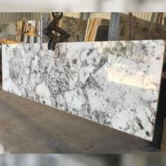 marble counter tops are being worked on in a factory