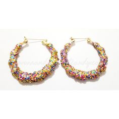 Glitter Bamboo Earrings/Hoop Earrings/ Bamboo Earrings/ Colorful Glitter Earrings/ Bling earrings/ Handmade Jewelry These beautifully sparkle earrings are coated in Colorful Glitter! Light Weight and the perfect addition to your outfit! Length: 3 Inches Width: 3Inches Trendy Sparkling Hoop Earrings For Party, Small Hoop Beaded Earrings For Party, Party Small Hoop Beaded Earrings, Multicolor Round Earrings For Birthday, Gold Beaded Small Hoop Earrings For Party, Multicolor Festive Round Hoop Earrings, Round Hoop Earrings For Party, Party Hoop Beaded Earrings, Trendy Rainbow Earrings For Party