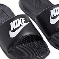 Black Slip-on Flip Flops For Leisure, Black Slip-on Sandals For Leisure, Casual Black Sandals For Leisure, Sporty Black Summer Slippers, Black Sporty Summer Slippers, Black Cushioned Sandals For Leisure, Black Leisure Sandals With Cushioned Footbed, Nike Casual Synthetic Slippers, Nike Casual Synthetic Flip Flops