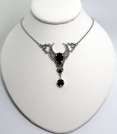 This is a new handmade necklace. It is made with antiqued silver plated filigrees, accented with high quality JET BLACK glass rhinestones. Decorated portion is 2 3/8" wide and 2 1/2" tall in the center. Necklace is adjustable 15-18" with a lobster clasp and chain extender. If you would like a different length, please send us a message.Matching headpiece and earrings are listed in our store. Goth Stuff, Goth Things, Elegant Pants, Antique Silver Necklace, Black Diamond Necklace, Gothic Glam, Lipstick Stain, Gothic Victorian, Choker Pendant