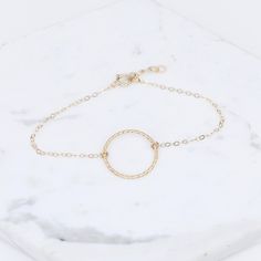 "14K karma gold bracelet - Solid Gold Bracelet, 14k delicate bracelet ★ Circle charm is 14k solid gold, it is about 17mm ★ The chain and all components are 14K solid yellow gold It comes with a 1/2\" extension chain. (If you order a 6\" bracelet, it will be a 6\" bracelet plus 1/2\" extension.) Please read our policies before you place your order. https://www.etsy.com/shop/SashJewelry/policy?ref=shopinfo_policies_leftnav To see other Mother daughter necklace set click here: https://www.etsy.com/ Adjustable Minimalist Bracelets In Recycled Gold, 14k Yellow Gold Bracelet With Simple Design, Minimalist Adjustable Bracelets In Recycled Gold, Minimalist Adjustable Recycled Gold Bracelets, Simple 14k Yellow Gold Bracelet, Dainty Yellow Gold Circular Jewelry, Yellow Gold 14k Bracelet, Dainty Circle Yellow Gold Jewelry, Rose Gold Round Bracelets In 14k Gold Filled