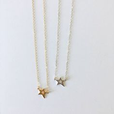 A lovely little shooting star (measuring about 12mm) is hung from a gold fill or sterling silver chain. The star pieces are made from either sterling silver or sterling silver plated in 22k gold.Each Luminous Collection necklace will come packaged and ready to give as a gift.View other pieces inspired by the sky in our Luminous Collection:https://www.etsy.com/shop/AcuteDesigns?ref=seller-platform-mcnav&section_id=23458094***********************************************************Item will be shi Silver Star Print Jewelry As Gift, Silver Jewelry With Star Print As Gift, Silver Star Print Jewelry For Gift, Delicate Star Shaped Jewelry For Gifts, Everyday Delicate Star Charm Necklaces, Delicate Silver Star Jewelry, Minimalist White Gold Star Jewelry, Delicate Star-shaped Jewelry Gift, Delicate Star-shaped Jewelry For Gift