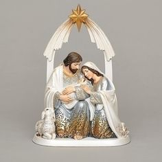 a nativity figurine depicting the birth of jesus and his wife, mary