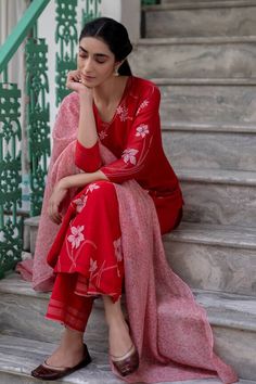 Red kurta with applique embroidered floral motifs. Comes with pant and dupatta.
Components: 3
Fabric: Cotton Chanderi
Neckline: V neck
Sleeve Length: Three fourth
Color: Red
Embroidery
Floral motifs on dupatta - Aza Fashions Poppy Applique, Applique Kurta, Conscious Clothing, Red Kurta, Kurta Set For Women, Coral Fabric, Natural Clothing, Red Embroidery, Kurta With Pants