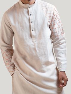 This Geometric Thread Kurta Set will instantly give an elegant look. This 2 piece kurta set features a linen cotton kurta with web style geometric threadwork on sleeves, sequin embroidery with front buttons fastening, and a mandarin collar. It is paired with narrow fitted pajama pants in cream color and malai cotton fabric. An ideal outfit for traditional occasions, and special events.

Size Chart For Men





	
	
					Men's Size Chart
		

		
		
						
				Size Chart For Men
				Custom Size Meas Mens Kurta Pajama, Gents Kurta, Kurta Men, Mens Kurta Designs, Mens Kurta, Sequin Embroidery, Embroidery Bags, Kurta Pajama, Cotton Kurta