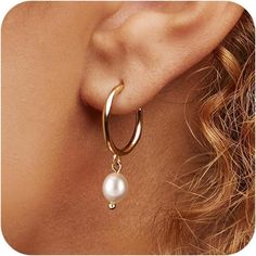 Product Details Material: Brass Metal: Yellow Gold Back Finding: Hinged Hoop Gem: Cubic Zirconia Item Type: Hoop Earrings These Elegant Pearl Hoop Drop Earrings Are A Stunning Blend Of Classic Sophistication And Modern Design. Featuring A Sleek Hoop That Gently Suspends A Lustrous Pearl, They Exude Timeless Beauty. The Smooth, Iridescent Surface Of The Pearls Reflects Light Beautifully, Creating A Captivating Shimmer With Every Movement. Perfect For Both Formal Occasions And Everyday Wear, These Wedding Earrings Gold, Gold And Pearl Earrings, Hoop Drop Earrings, Gold Earrings Wedding, Dangling Earrings, Girly Jewelry, Wedding Board, Brass Metal, Pearl Drop