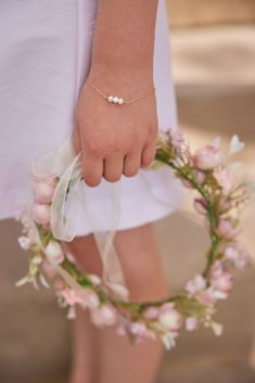 Little English x Hazen & Co's Triple Pearl Bracelet is the perfect dainty addition to your little girl's look. Delicate and precious, the Triple Pearl Bracelet is one she can wear for years to come! Freshwater pearls + 14k gold-filled chain 5.5 + 1/2 extender Made in Texas Elegant White Bracelets, Elegant Hypoallergenic Bracelet For First Communion, Dainty Hypoallergenic Jewelry For First Communion, Elegant Bracelet For First Communion, Dainty Personalized Pearl Bracelet, Elegant Pearl Bracelet For First Communion, Dainty Pink Pearl Bracelet With Pearl Charm, Elegant Pearl Bracelet With Pearl Charm For First Communion, Adjustable Pearl Bracelet With Charm For First Communion