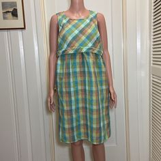 Northstyle Sleeveless Multicolored Plaid Fabric Midi Dress Size: 14 One Slip Pocket On Each Side Zips On The Back About 38” Long Armpit To Armpit (Bust): 20” Waist: 19" Arm Hole Width: 9" Bottom Hem Width: 23" Shell: 55% Linen 45% Cotton Lining: 100% Polyester No Stains, Tears Or Holes At All Excellent As Nwot Condition Clean And Smoke Free Home Quick Shipping- All Items Are Shipped Daily As Long As Usps Is Open. Make Me Offers! Message Me With Any Questions! You Like More Than One Item In My Cl Green Sleeveless Lined Sundress, Green Midi Sleeveless Dress For Daywear, Green Sleeveless Midi Dress For Daywear, Casual Green Sleeveless Dress For Daywear, Casual Green Sundress For Daywear, Green Sleeveless Dress For Daywear, Multicolor Sleeveless Sundress, Casual Multicolor Sundress For Daywear, Sleeveless Lined Orange Dress