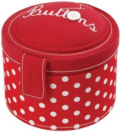 a red and white polka dot covered box with buttons on the lid, which says buttons