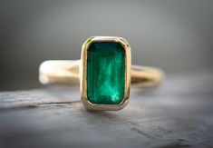 "14K Gold Emerald Ring measurements are: stone: 11x7mm   stone: 2.9 cts Gold: 3.28 grams USA size 7 Zambian emerald, unheated, untreated 100 percent natural Of all the gemstones Emerald is the purest representation of the open and active heart chakra.  Emerald can help one to remain centered in the hearts wisdom.  Emerald is known to help one overcome \"heartbreak\" helps one remember to give love to oneself and to others.  Emerald brings and energy of hope, encouragement, abundance, and gentle Antique Emerald Ring, Gold Emerald Ring, Stackable Birthstone Rings, Silver Anniversary Gifts, Silver Emerald Ring, Jewelry Emerald, Tourmaline Engagement Ring, May Birthstone Rings, Bridesmaid Rings